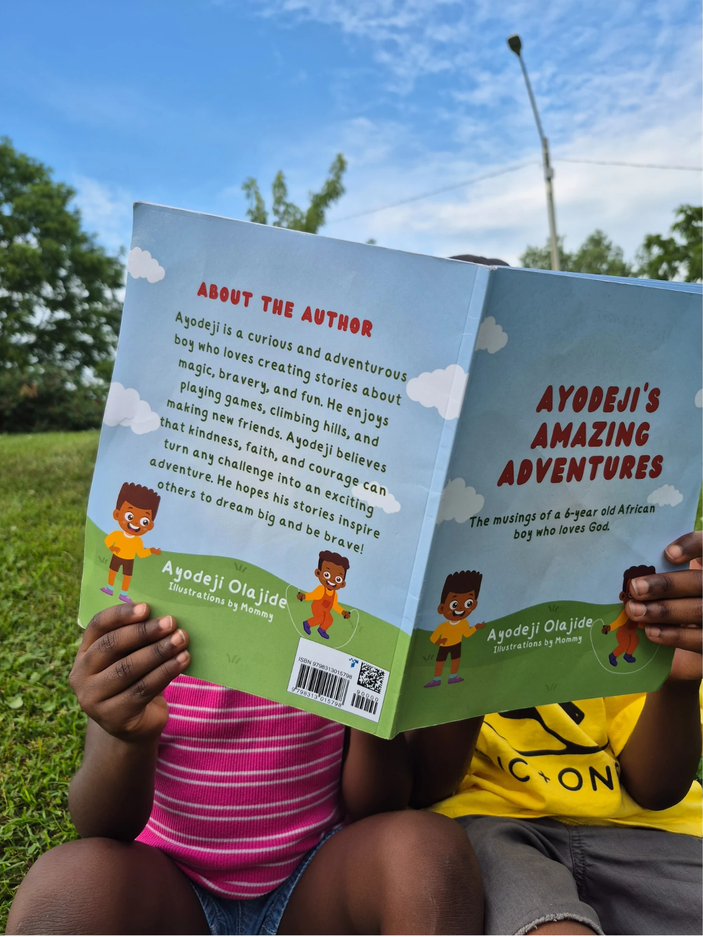 Young readers enjoying Ayodeji's book
